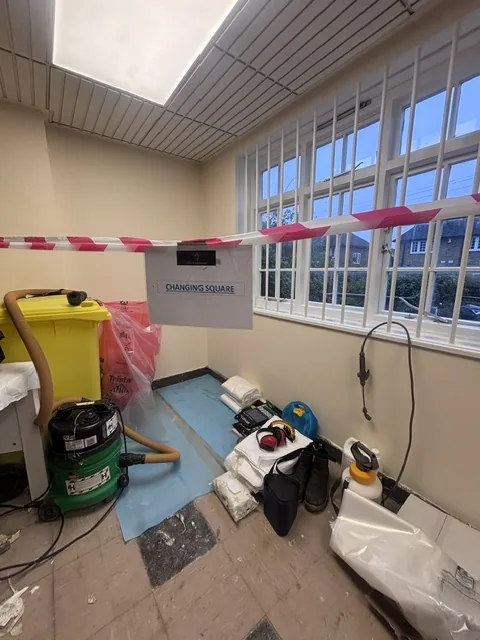 Asbestos floor tile and bitumen removal in Palmers Green